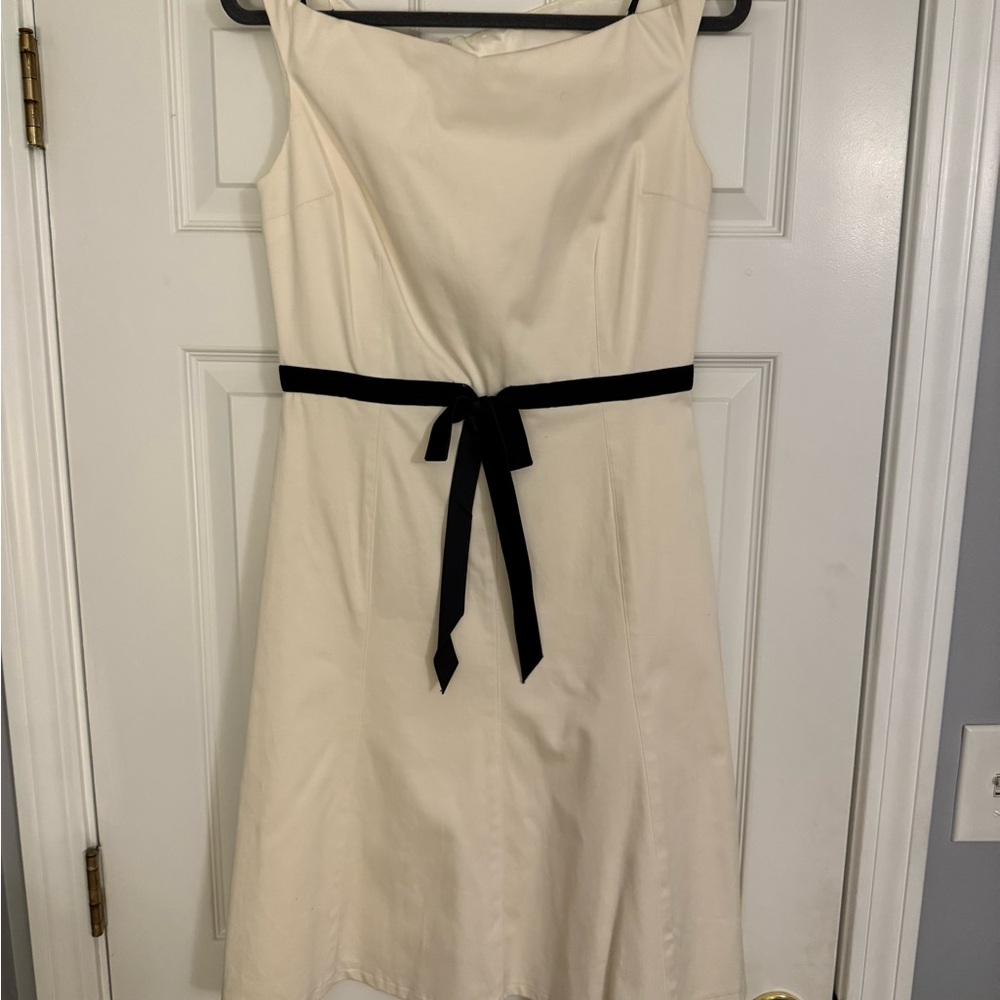 Elegant Cream Dress with Black Ribbon